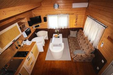 Фото номера Дом с 2 спальнями Шале Põhja Tooma Holiday Houses г. Suuresadama 3