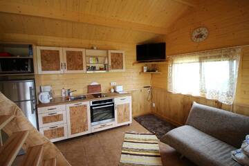 Фото номера Дом с 2 спальнями Шале Põhja Tooma Holiday Houses г. Suuresadama 4