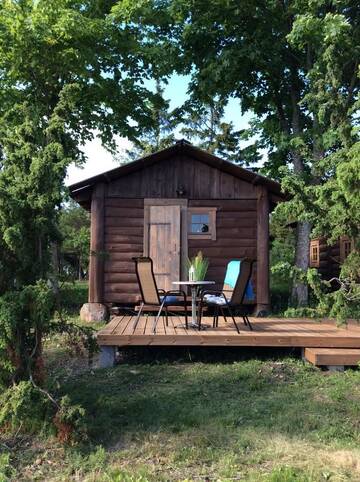 Фото номера Дом с 1 спальней Дома для отпуска Ungru Holiday Houses г. Suuresadama 8