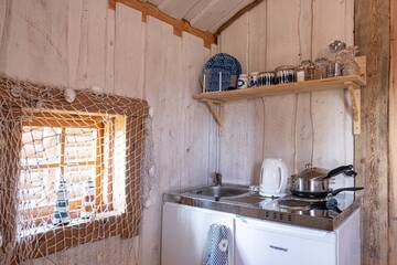 Фото номера Дом с 1 спальней Дома для отпуска Ungru Holiday Houses г. Suuresadama 13